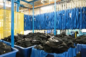 Bins of uniforms waiting to be laundered