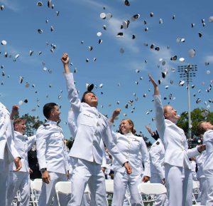 Midshipmen celebrating at commencement