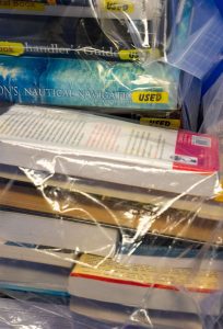 Textbooks in bags