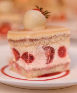 A dessert topped with a strawberry