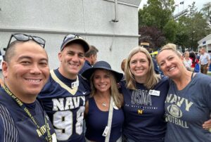 A group of alumni before a Navy football game